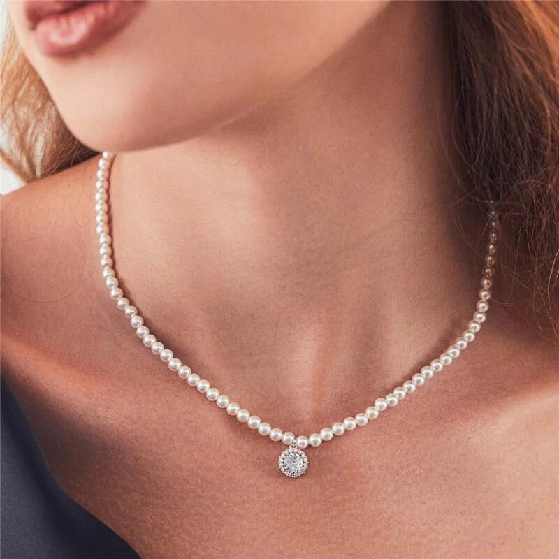 COLAR COM CRISTAL REDONDO E PÉROLA SHELL
