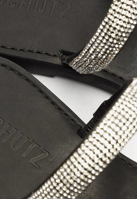 Sandália Rasteira Brilho Logo Preta e Prata Schutz